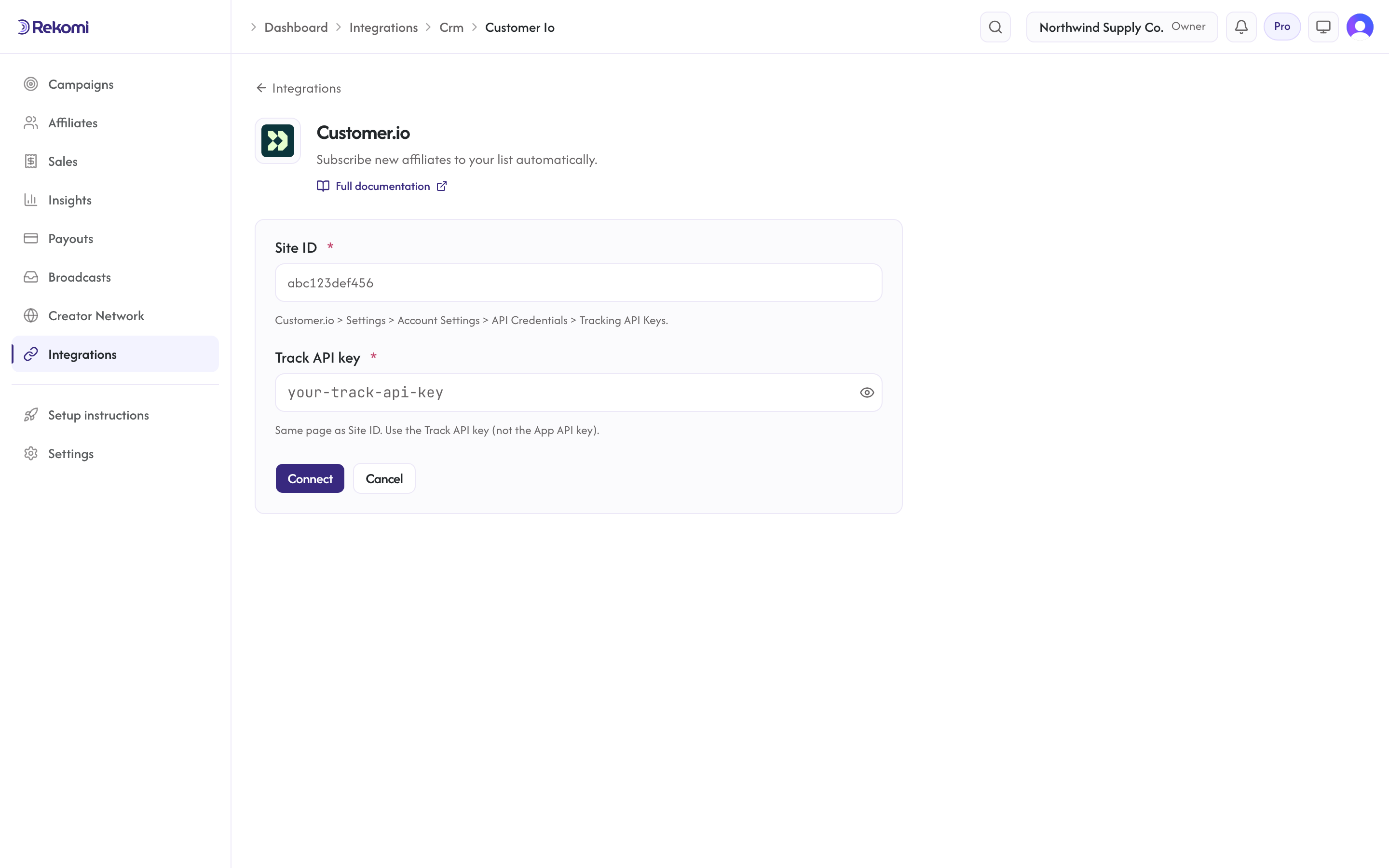 The Customer.io connect form in Rekomi with the Site ID and Track API key inputs and Connect button