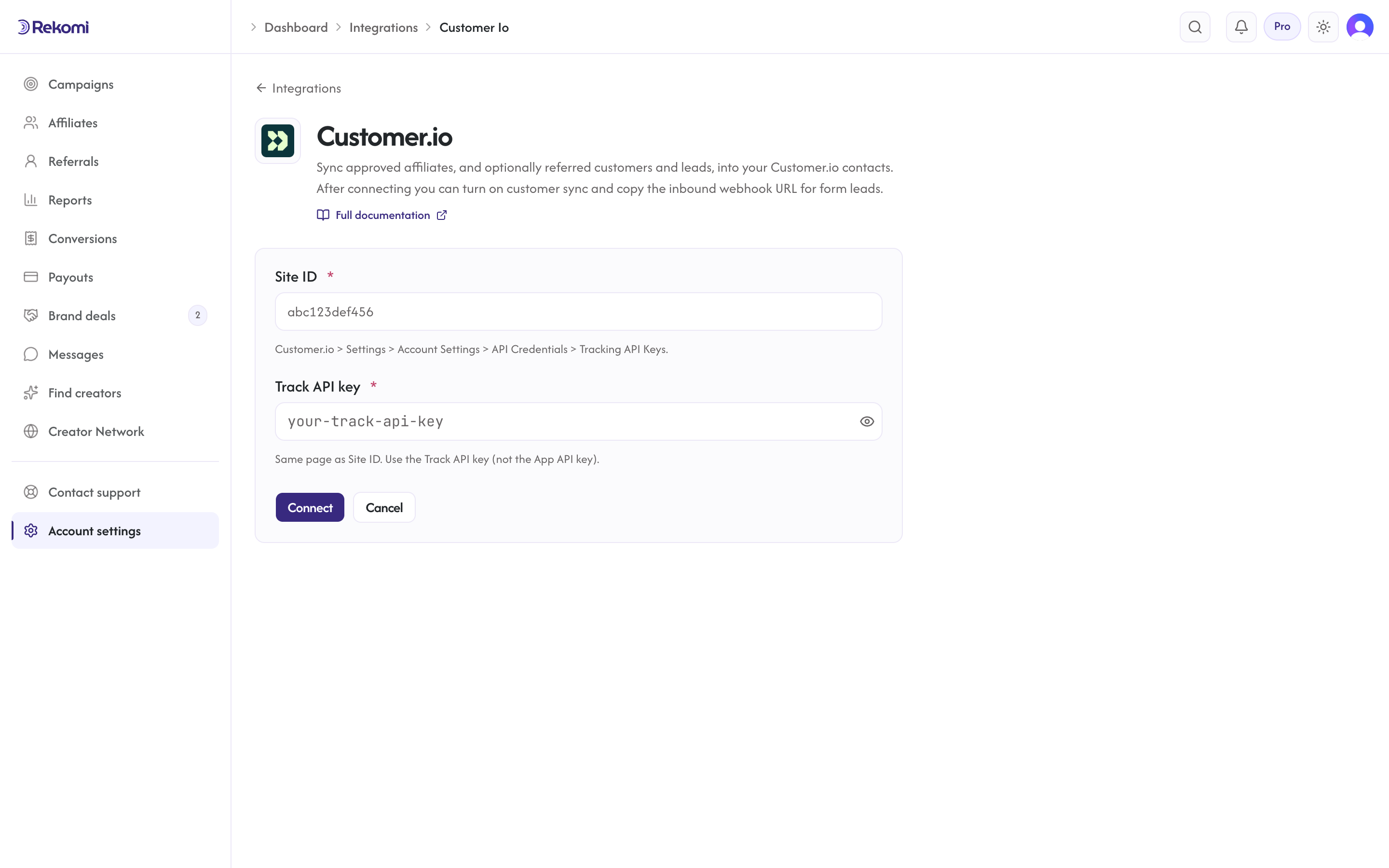 The Customer.io connect form in Rekomi with the Site ID and Track API key inputs and Connect button