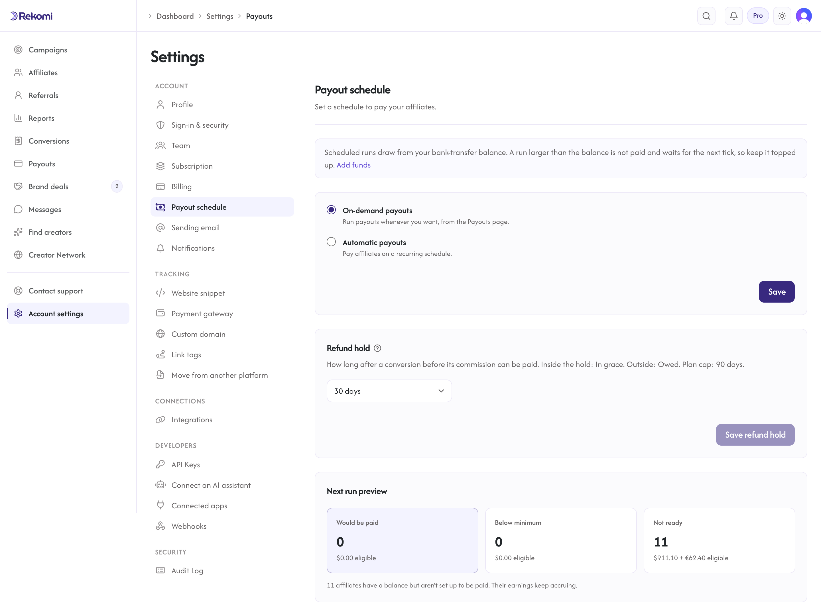 The payout schedule settings with on-demand vs automatic modes and the grace window selector