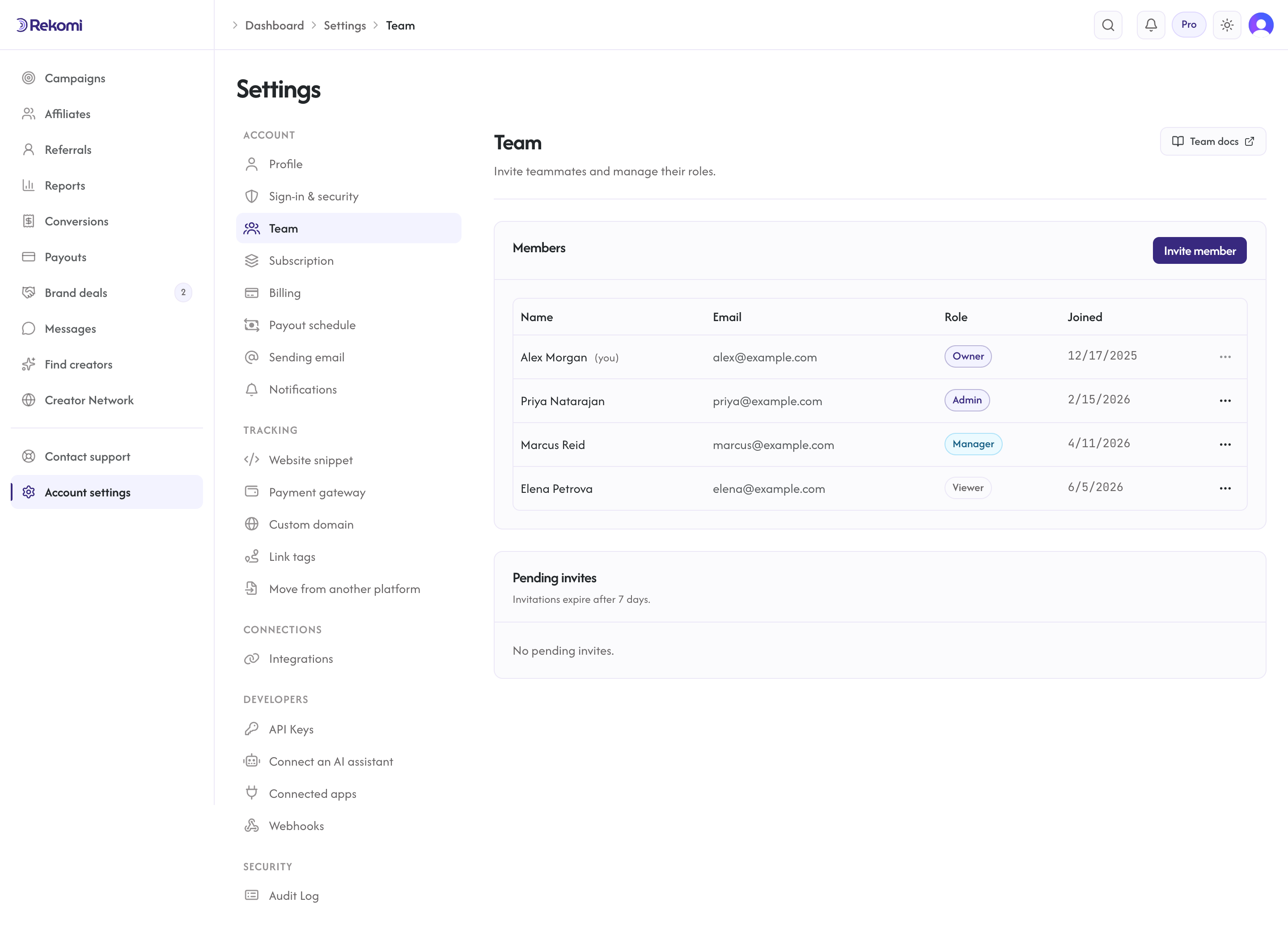 The Team page in Settings, showing the members list with roles and the pending invites table